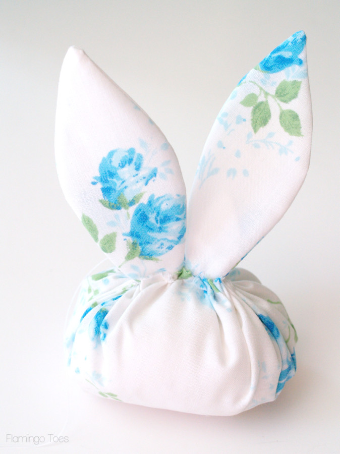 sewing ears to bunny