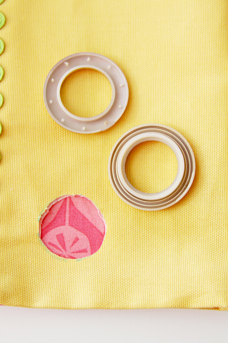 Cut circle in fabric for curtain grommet