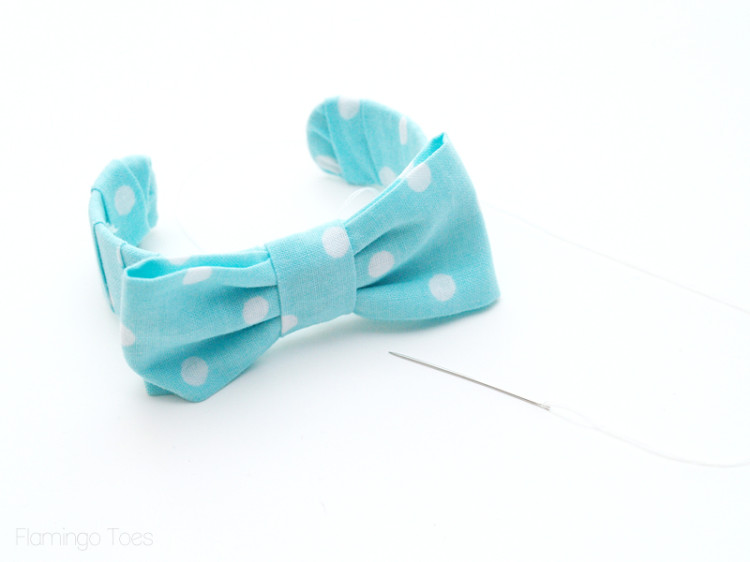 sewing bow to bracelet